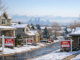 Colorado housing market stalled with homes and the Denver skyline in winter